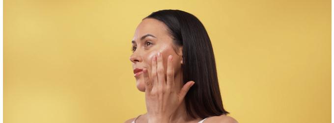 Lady applying our product Glowing Well