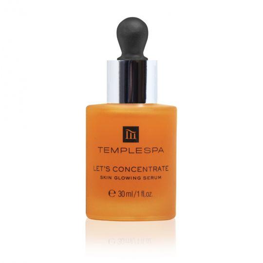 Orange bottle of Let's Concentrate skin glowing serum with pipette.