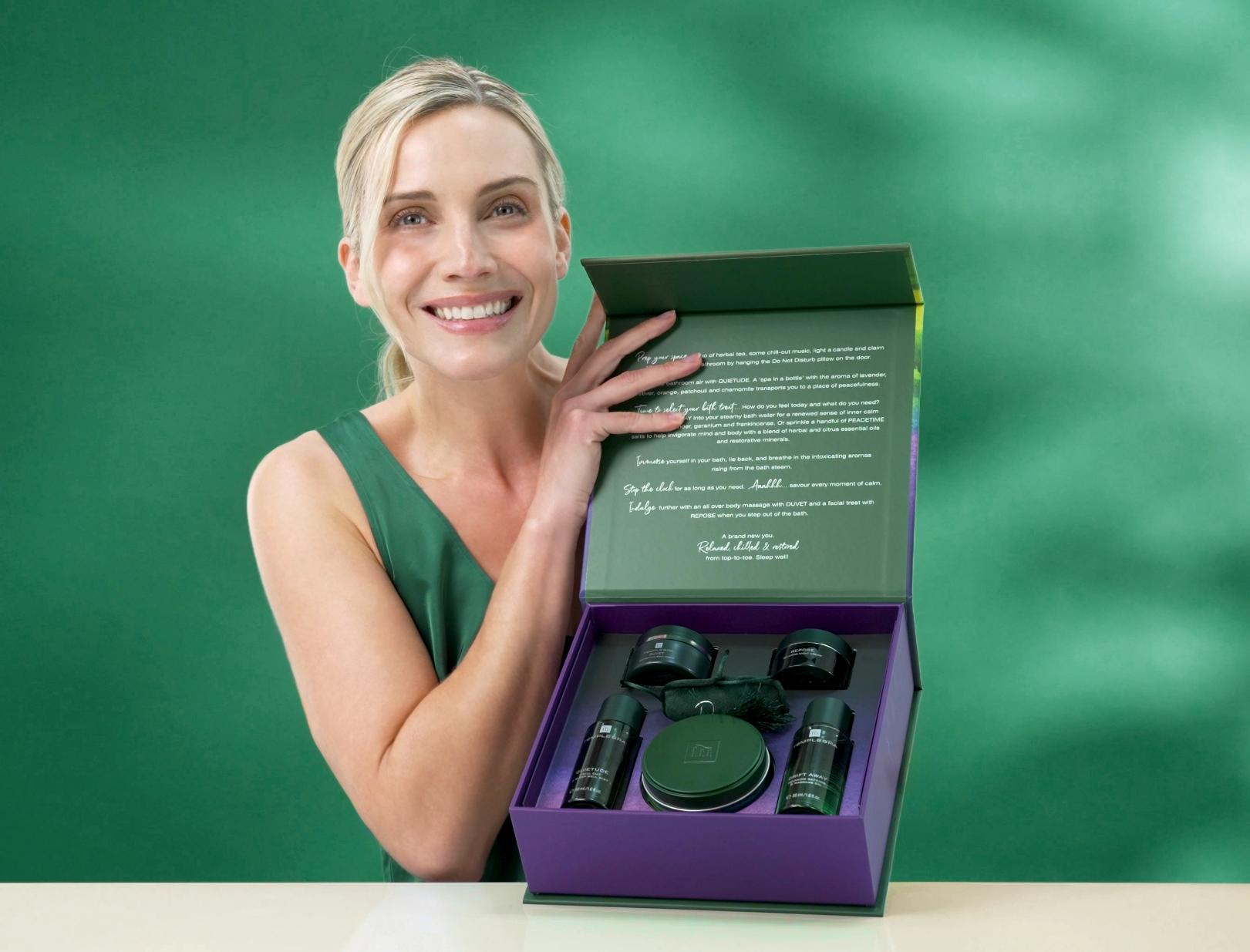 Gatitude bath and show luxe infront of a pink sunset background