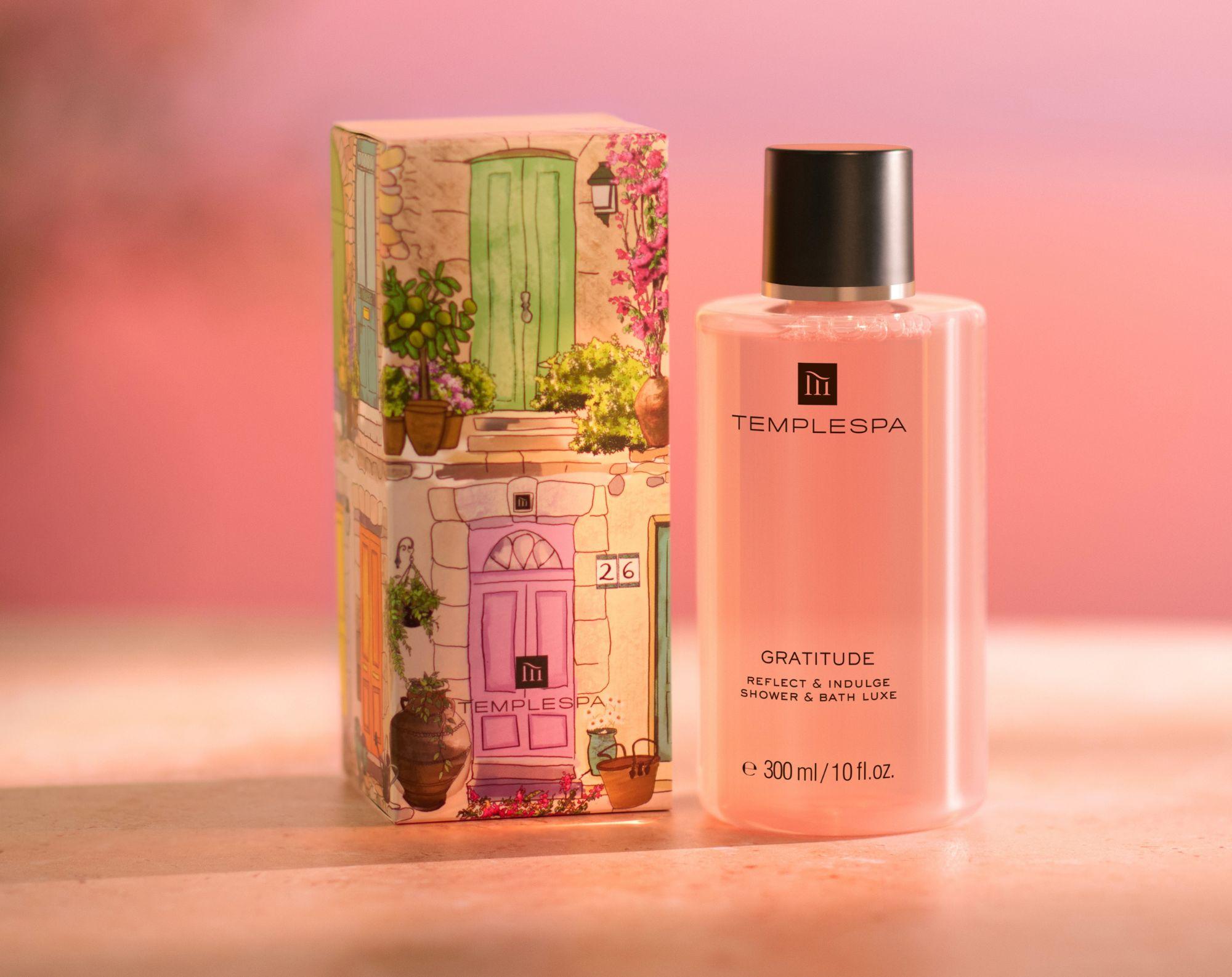 gratitude bath and shower luxe on a pink background