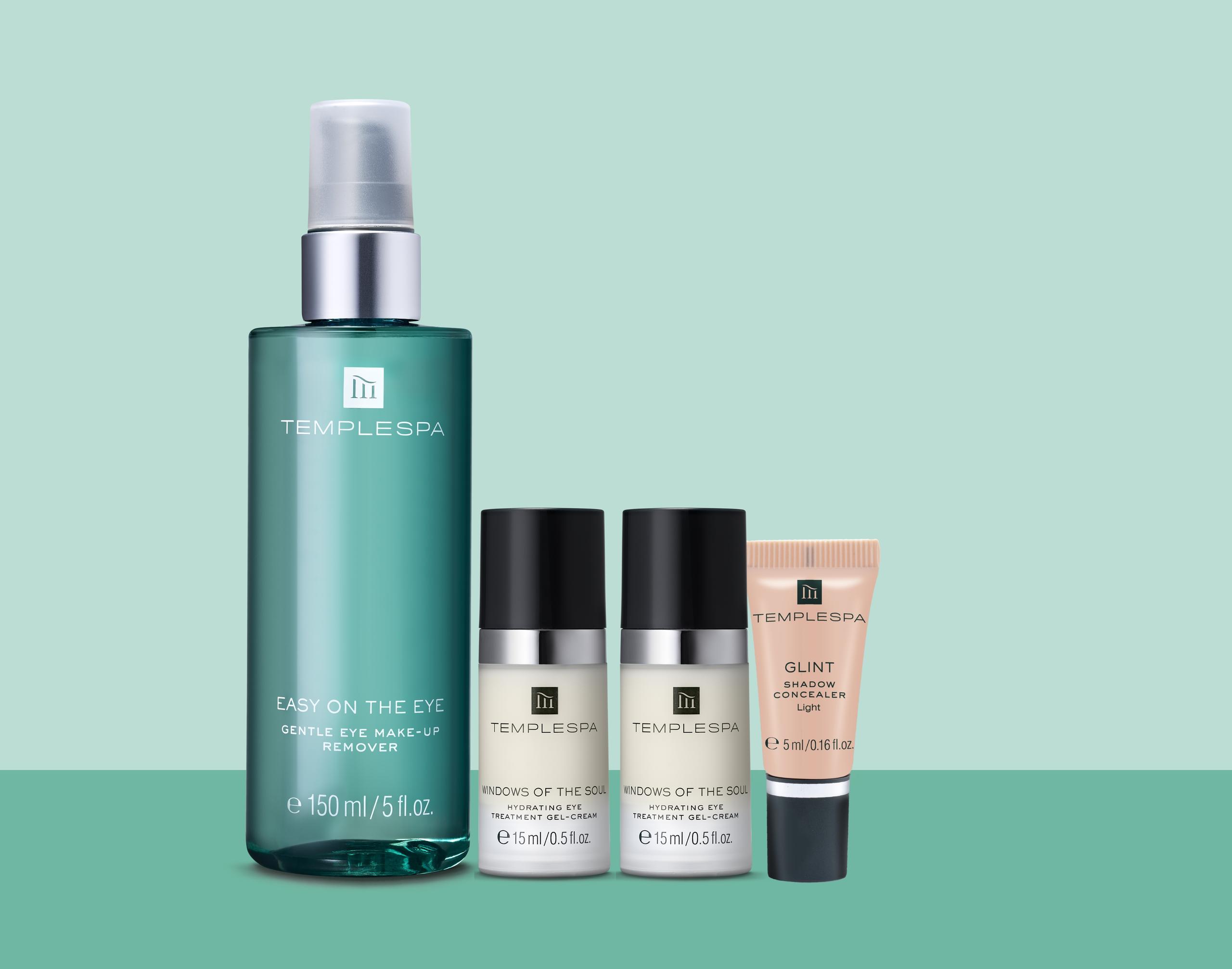 lady applying windows of the soul to her face with her fingertips