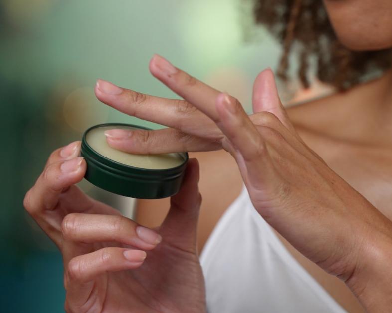TEMPLESPA product STRESS NOT, All-Over CBD Balm, being used by a lady