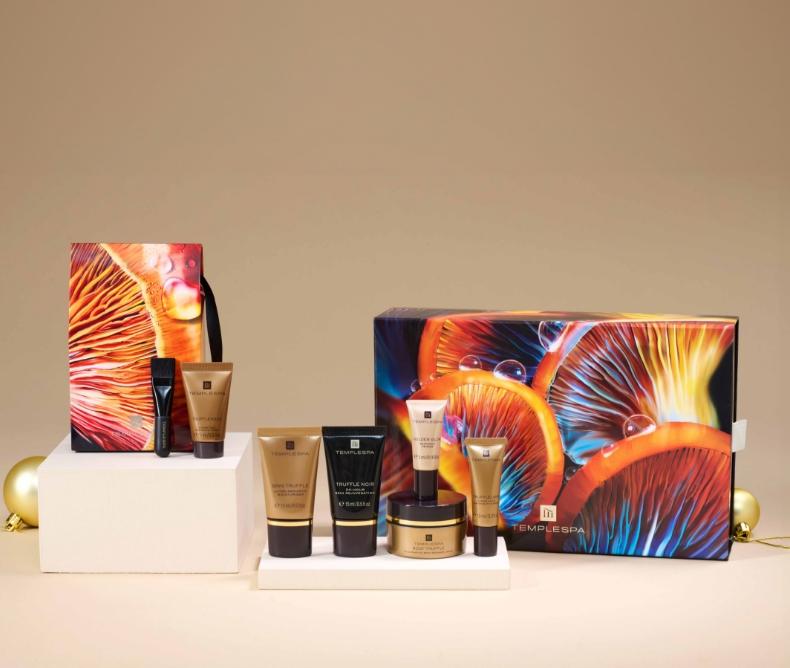 Women applying our glowing well primer