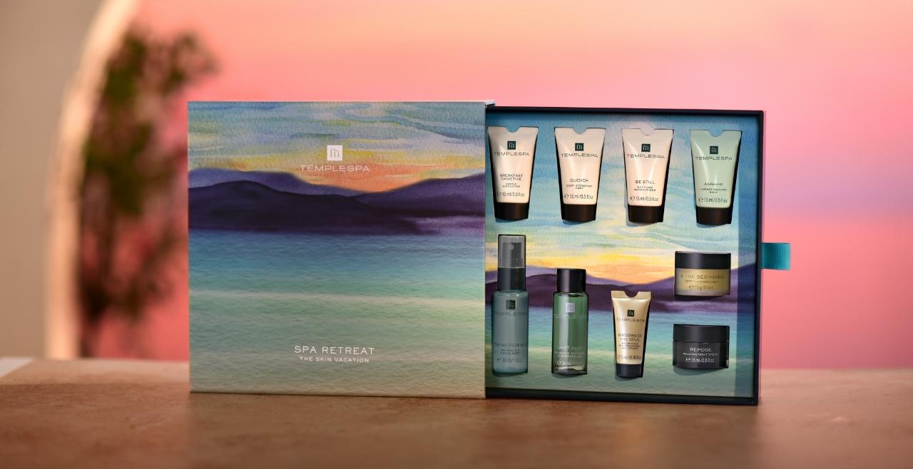 spa retreat gift box infront of pink sunset background
